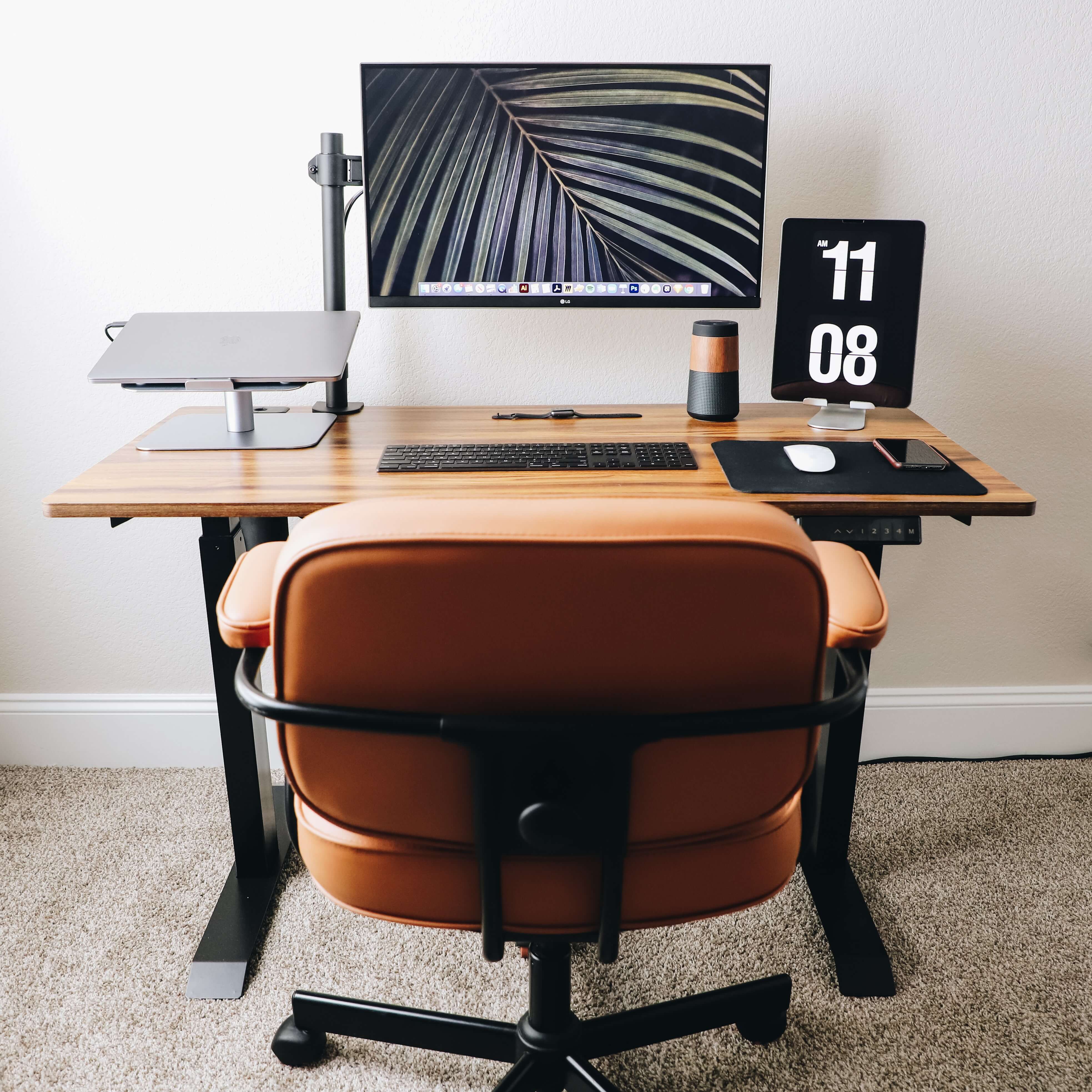 modern leather desk set up with monitor stand